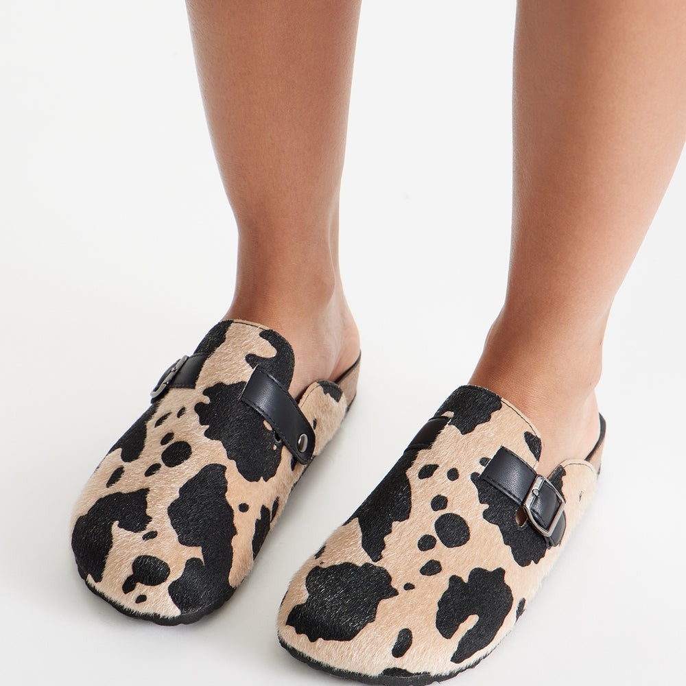 Acres Buckle Cow Print Slides